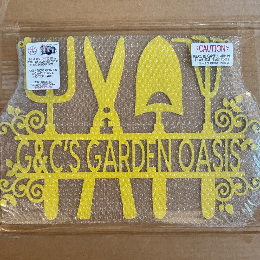 Custom made, metal, yellow garden sign.